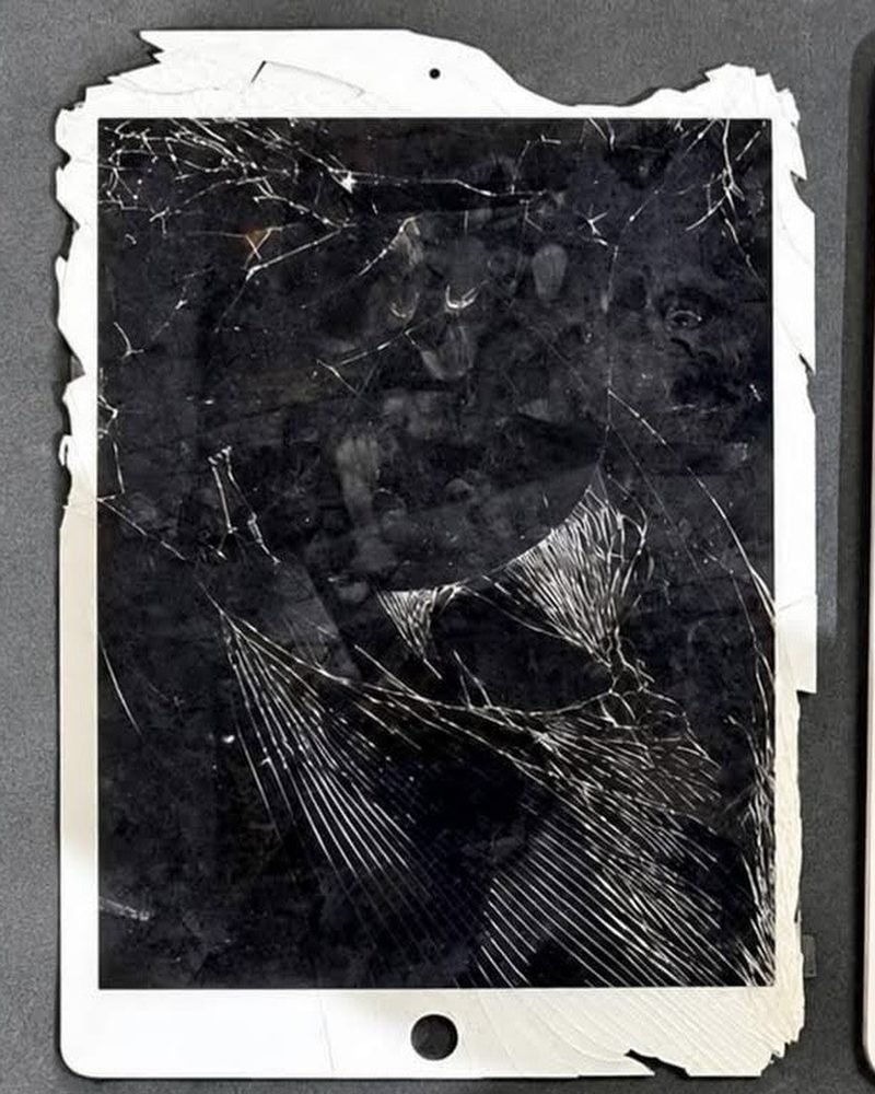 White tablet with worn glass, before