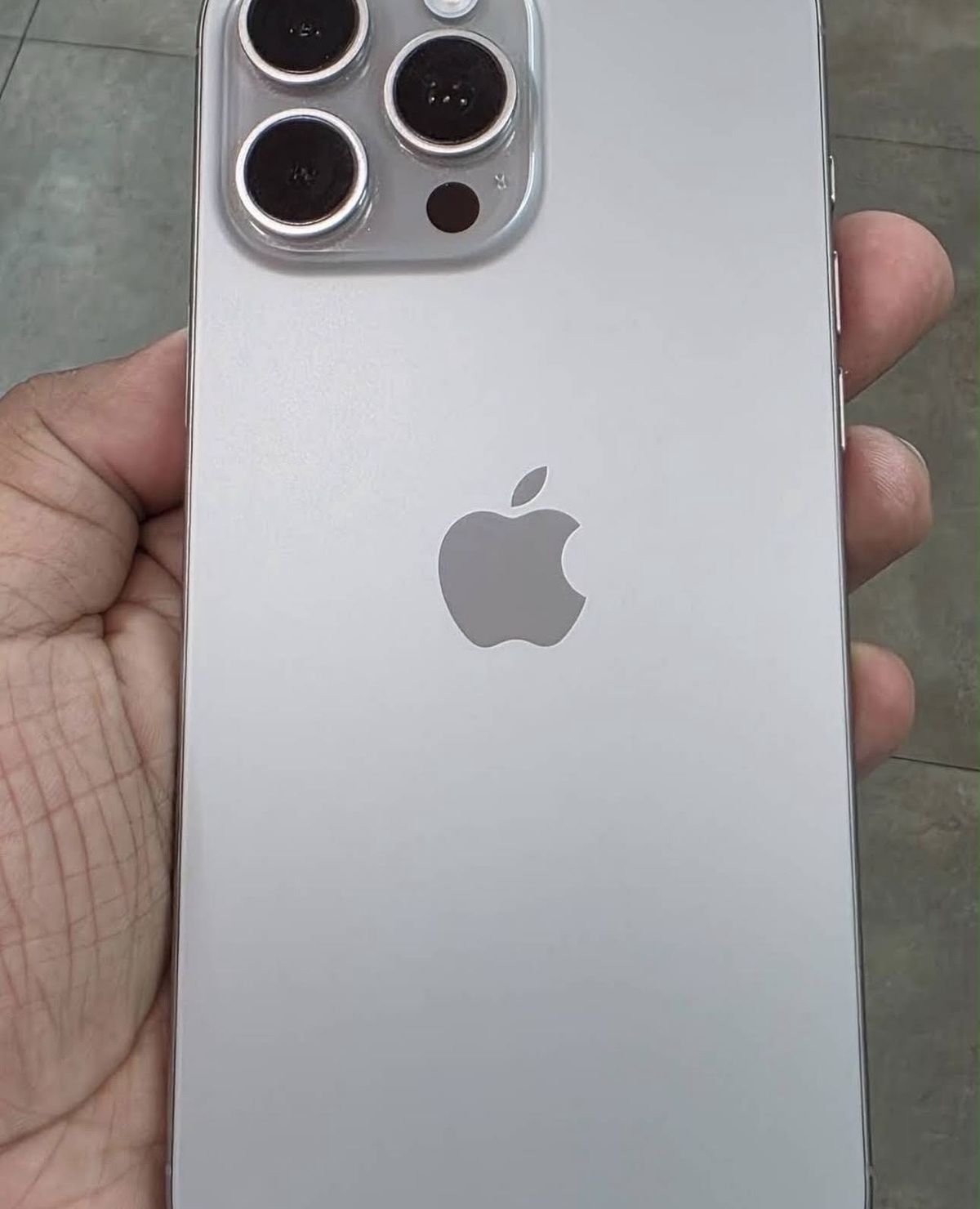 Pre-owned iPhone held in hand